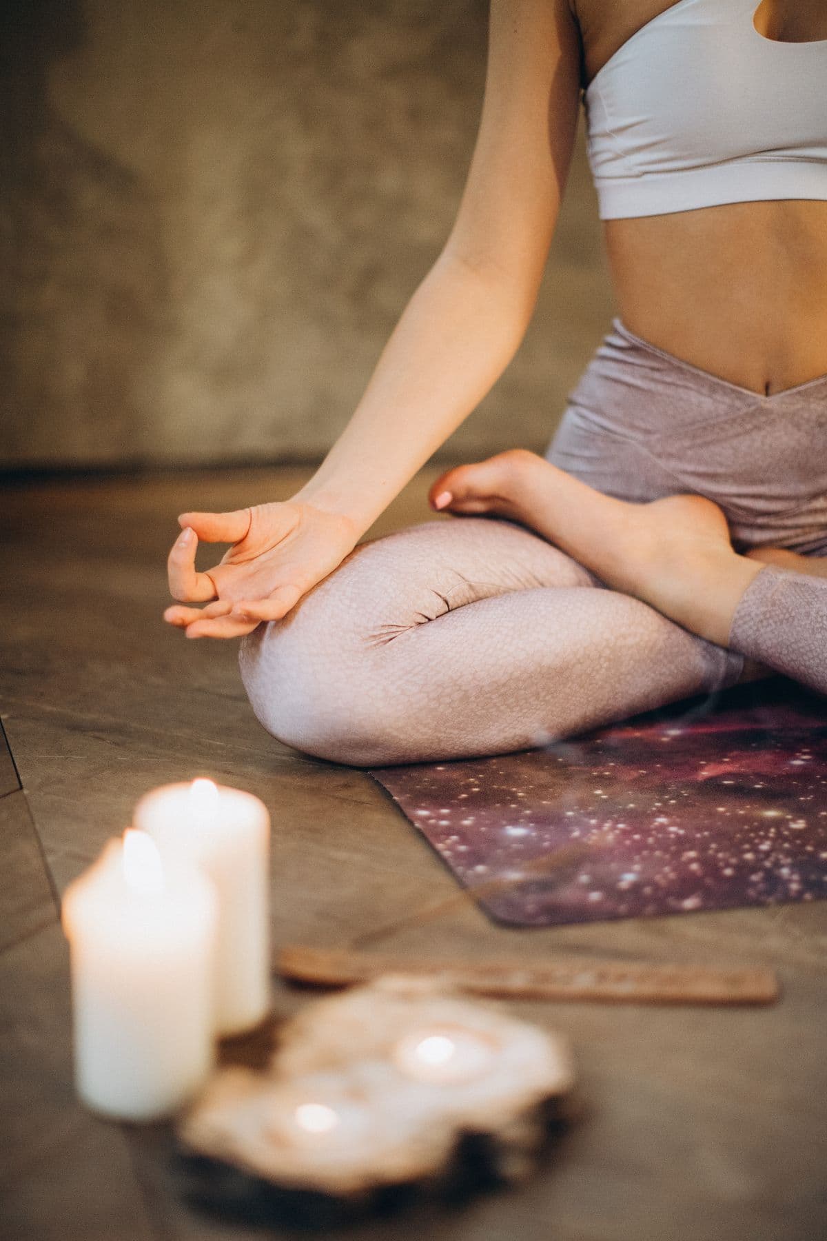 Candlelit, private space prepared for consent-led Yoni massage